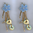 Handmade earrings with blue ceramic flowers