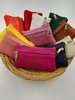 Small leather coin purses with front and back zipped pockets handmade in Spain