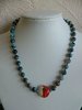 Blue Beaded Necklace with Large Orange Middle Bead